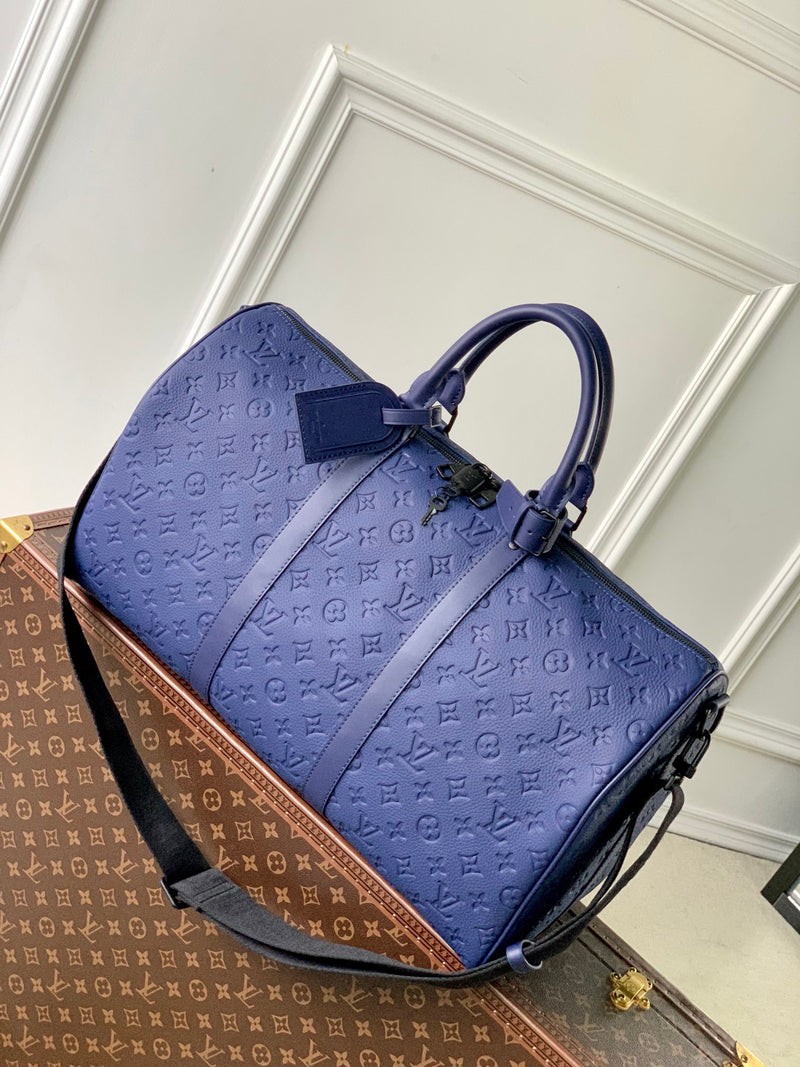LV duffle bags